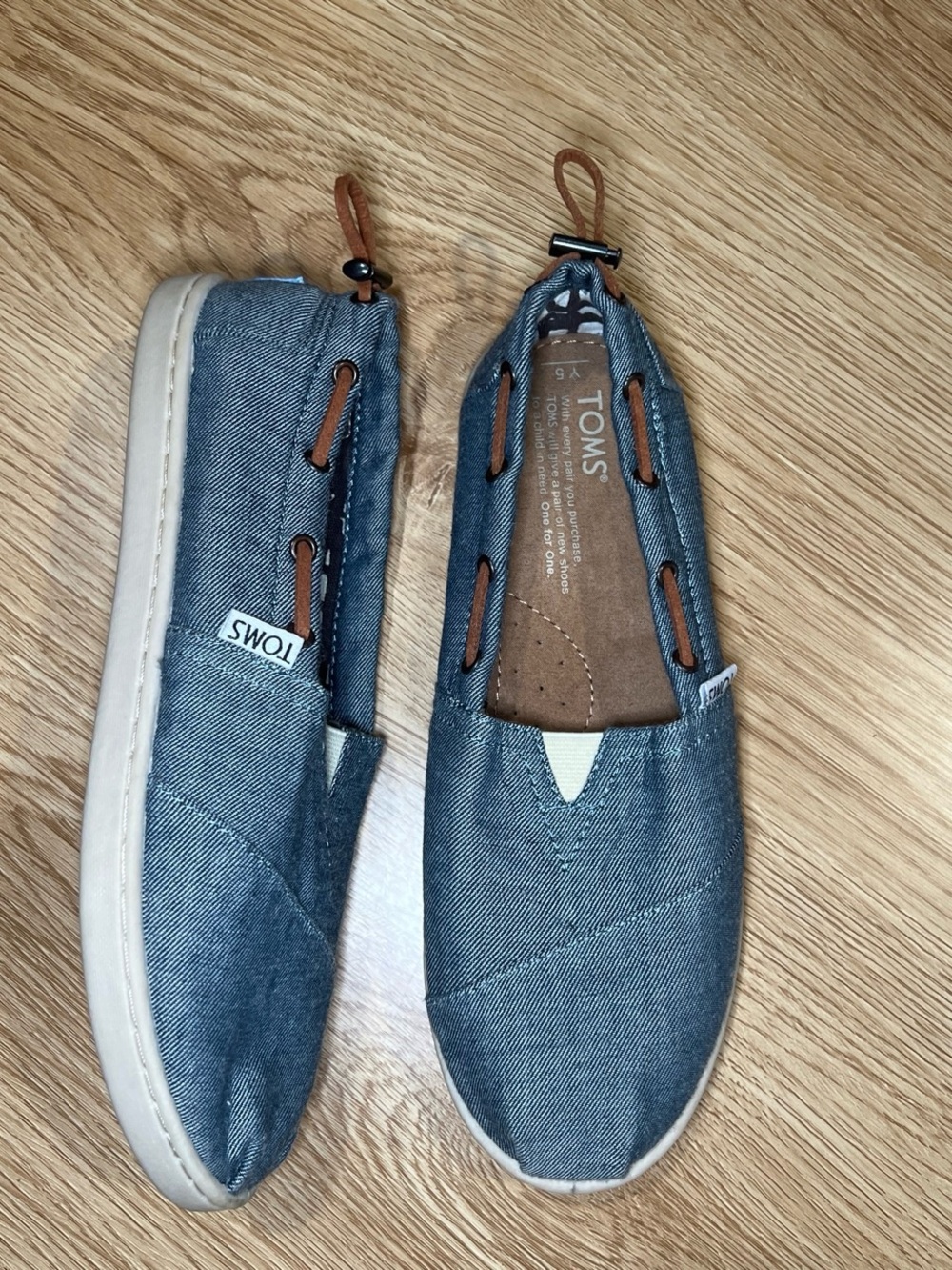 Toms blue canvas slip-on shoes size 5Y